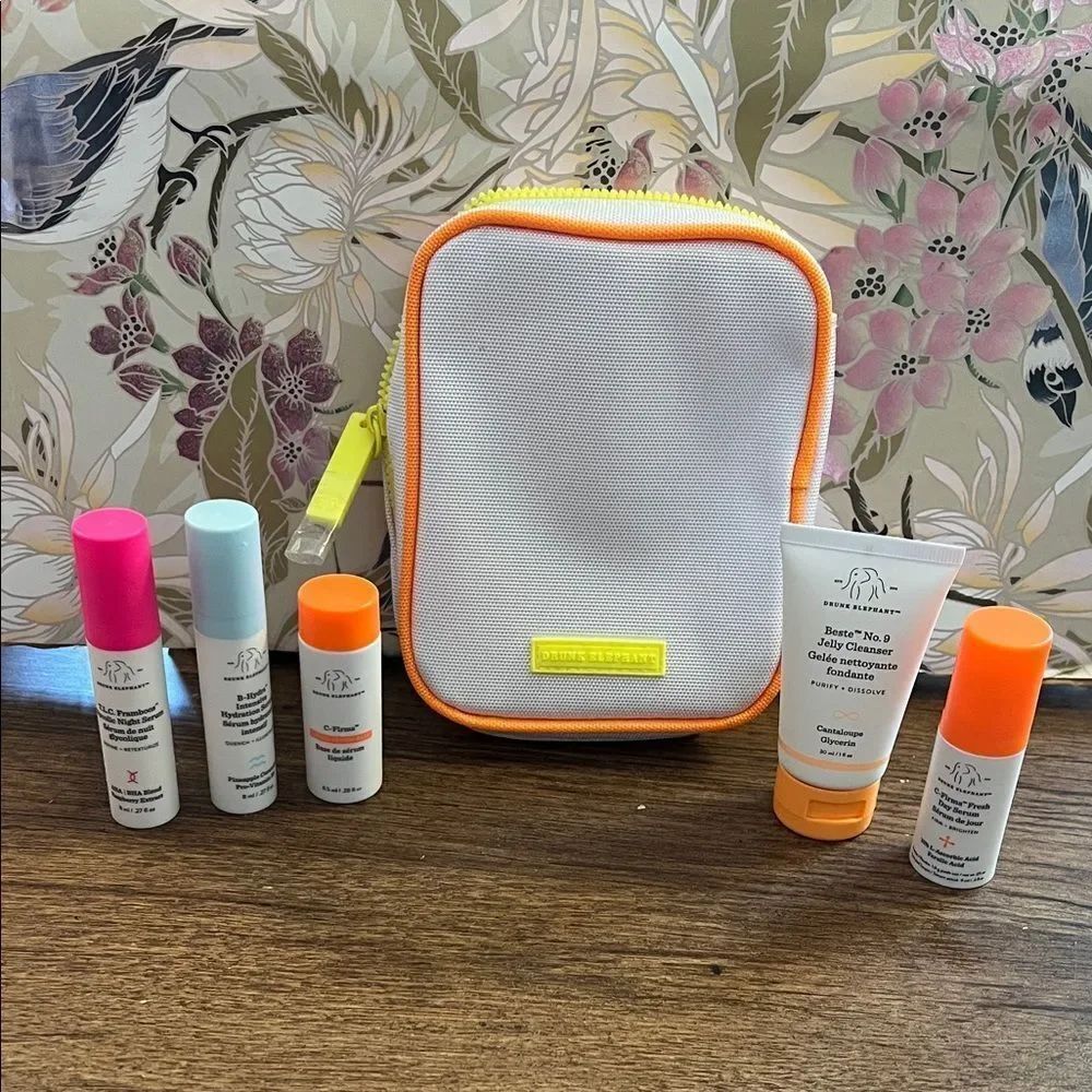Drunk Elephant Mini Skincare Set in White with Orange and Pink Accents